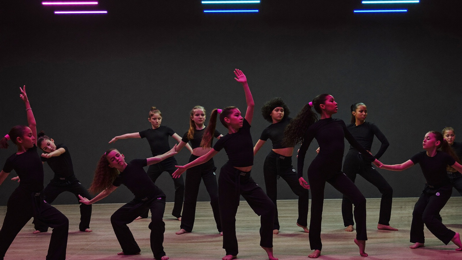 Young dancers of mixed ages training together at New Era Studios, Huyton